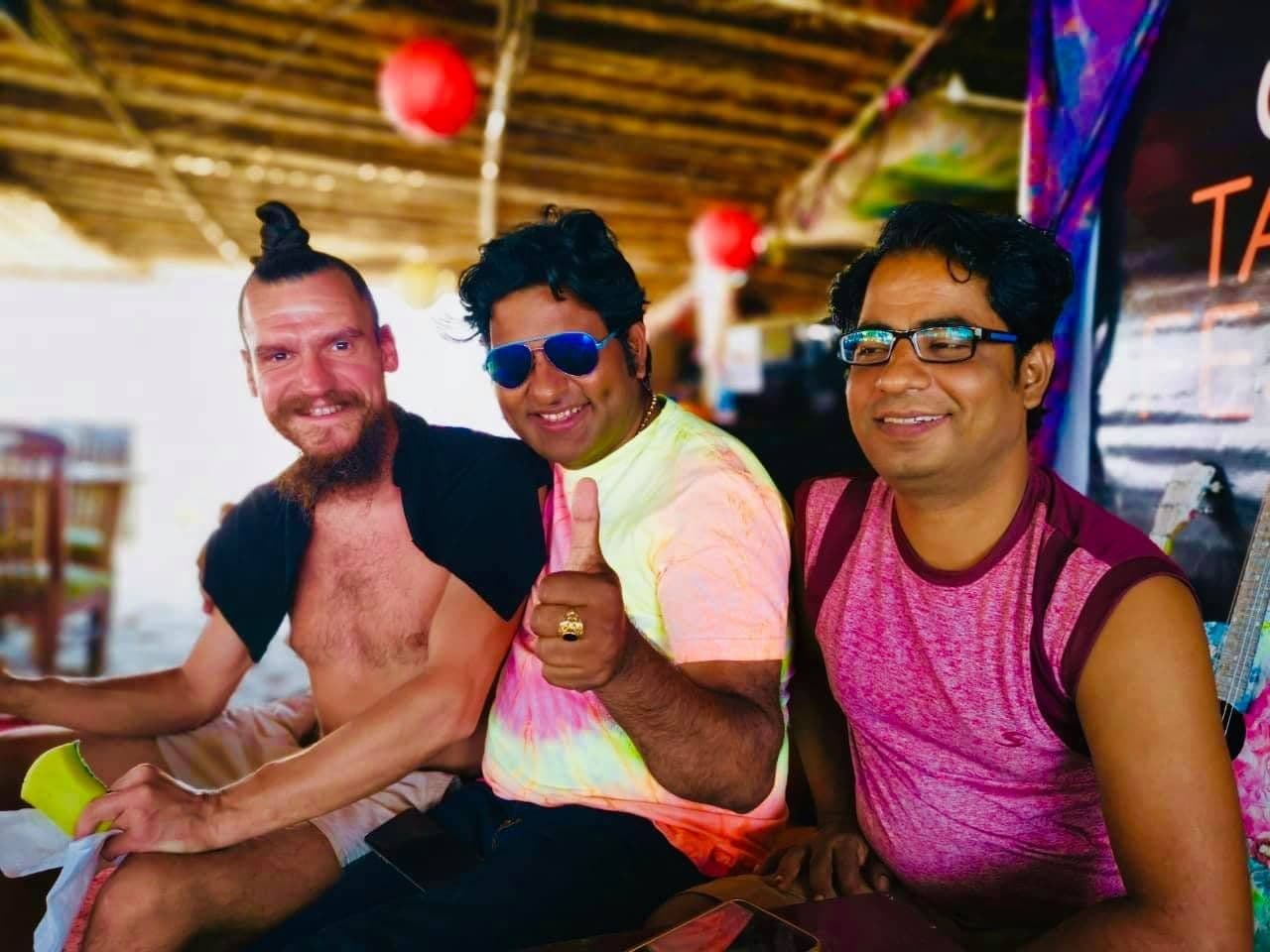 Dr. D.P. Shukla with two friends at a beach shack