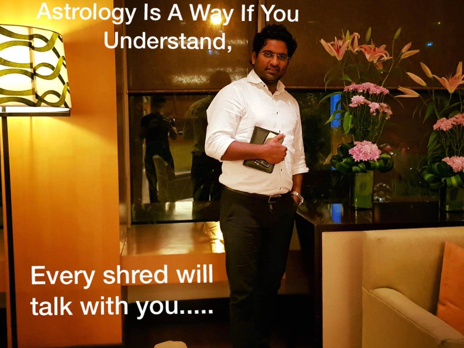 Dr. D.P. Shukla in a hotel lobby, captioned “Astrology is a way if you understand. Every shred will talk with you.”