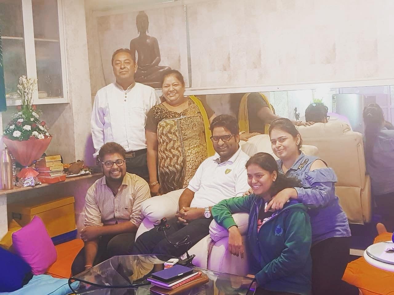 Family and friends gathered in a living room