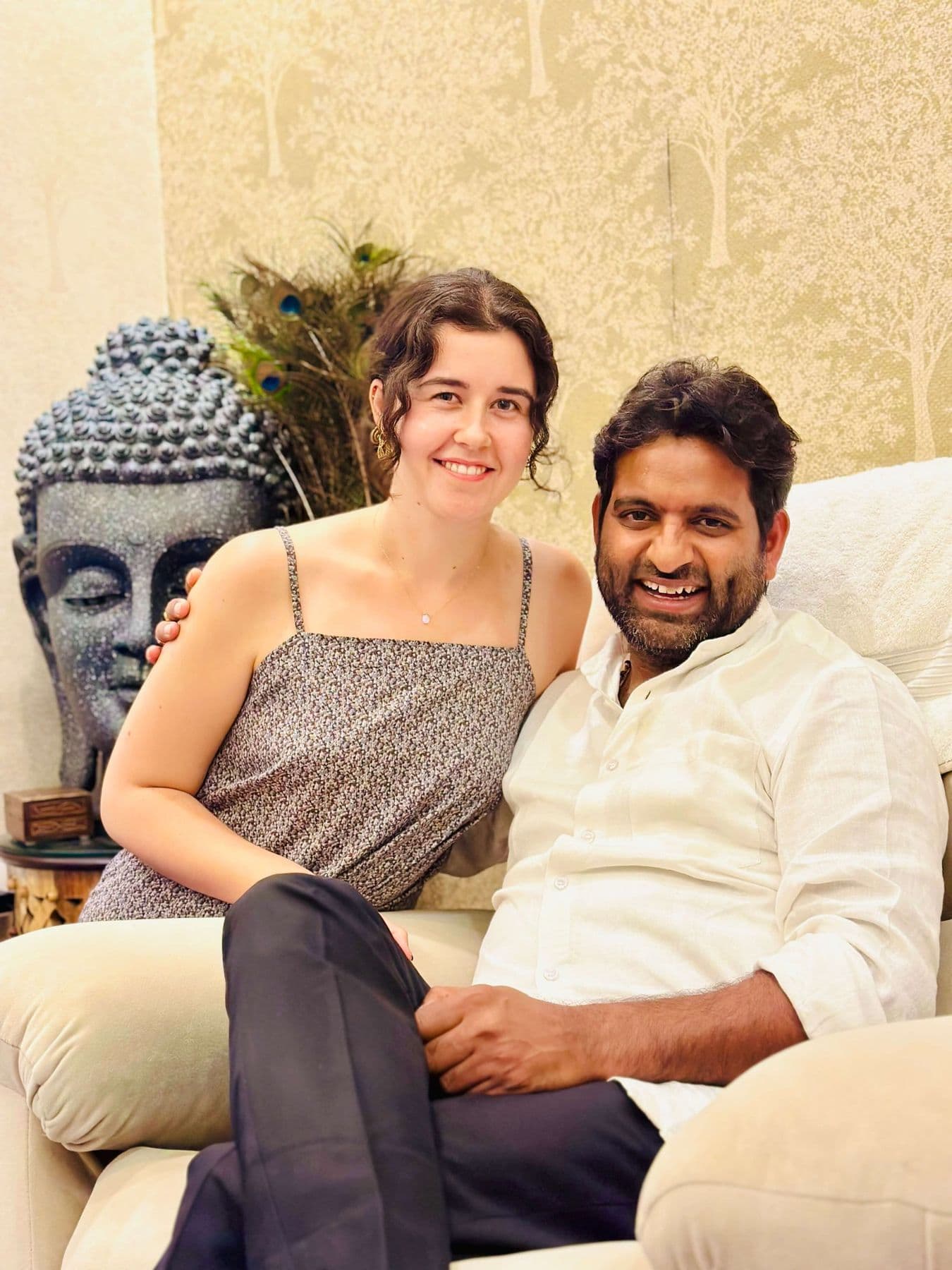 Dr. D.P. Shukla and a young woman seated together, smiling