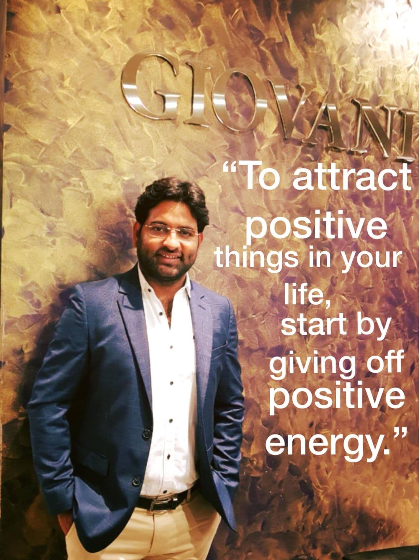 Quote card with Dr. D.P. Shukla in a suit: “To attract positive things in your life, start by giving off positive energy.”