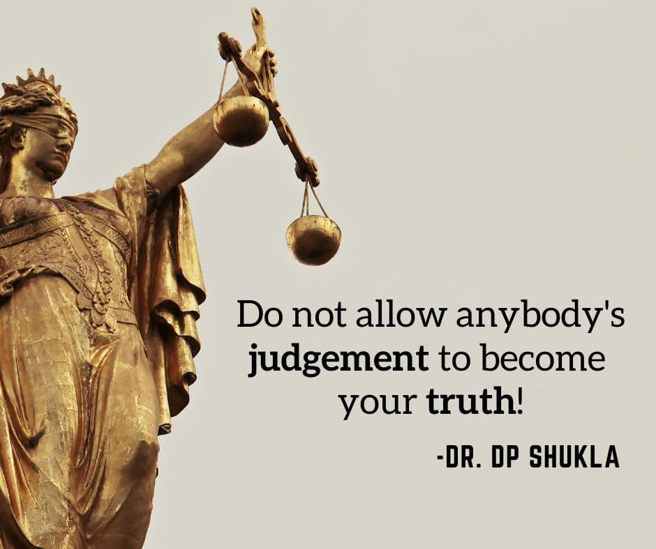 Quote card beside a statue of Justice: “Do not allow anybody’s judgement to become your truth!”