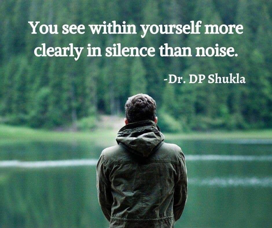 Dr. D.P. Shukla by a lake, captioned “You see within yourself more clearly in silence than noise.”