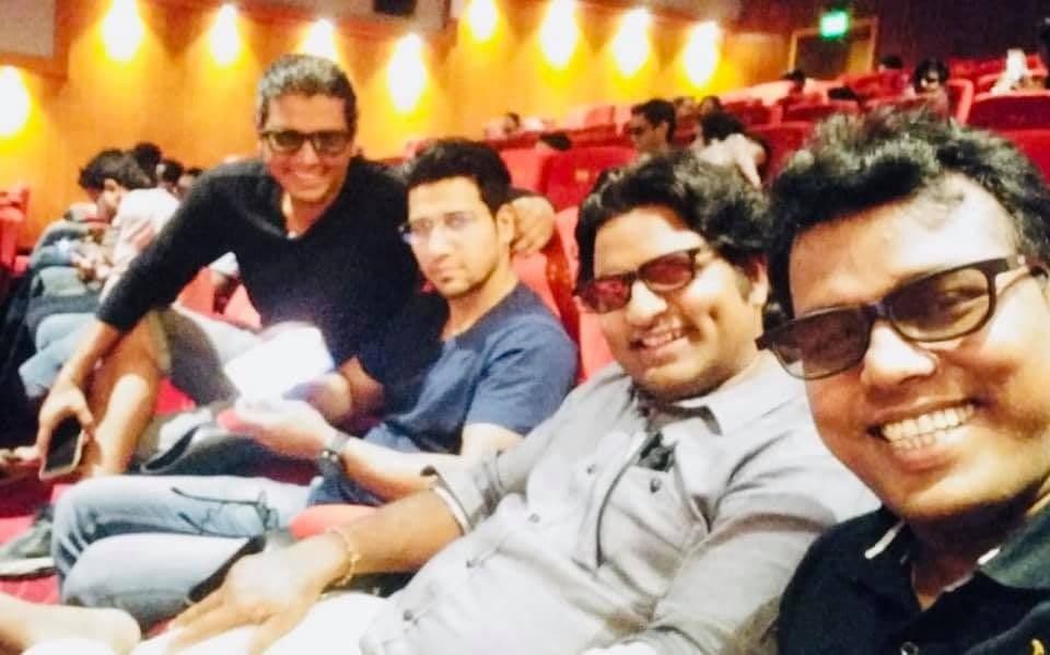Dr. D.P. Shukla with friends in a cinema
