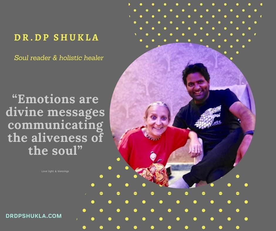 Poster: “Emotions are divine messages communicating the aliveness of the soul”, with a photo of Dr. D.P. Shukla and a guest