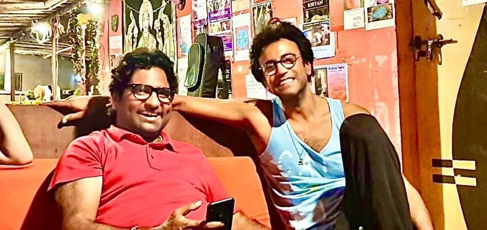Dr. D.P. Shukla and a friend relaxing at a café